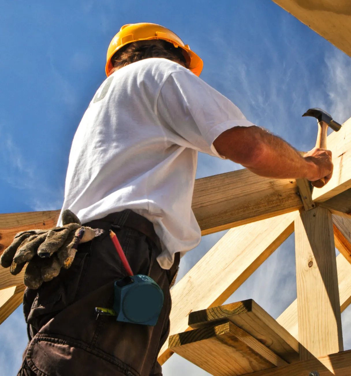 Builder working on wood framing during ADU construction in Los Angeles