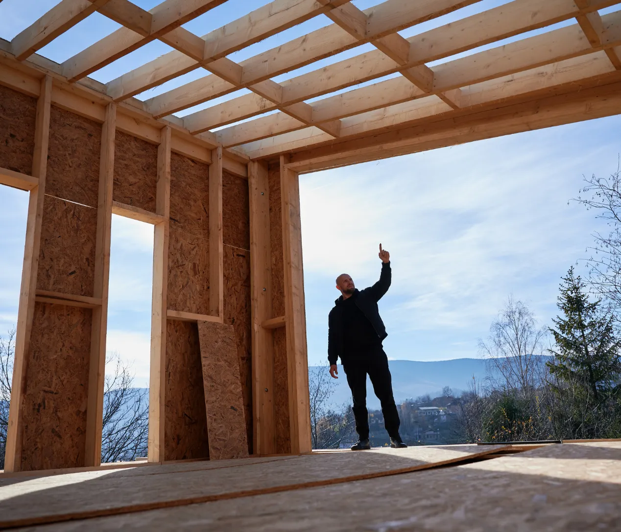 Construction crew raising wall framing for detached ADU construction in Los Angeles