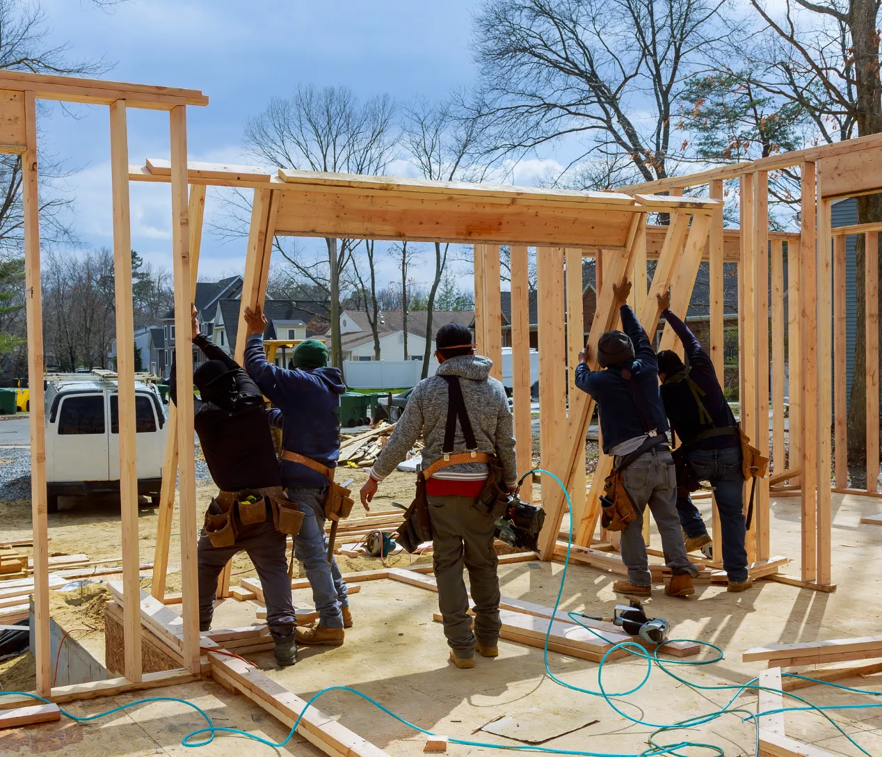 Roof framing and sheathing installation for attached ADU construction project in Los Angeles