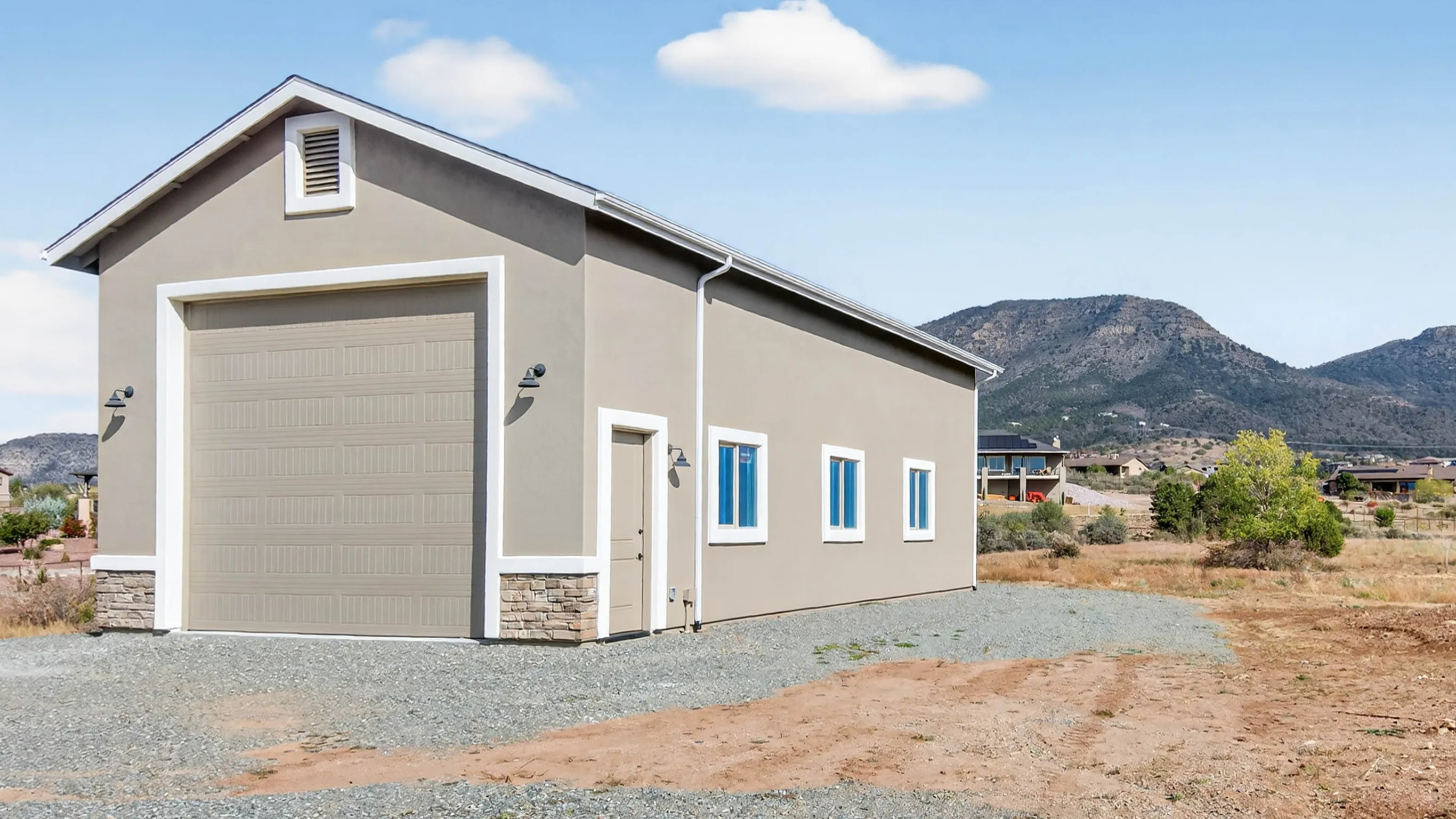 Before ADU construction showing original backyard space with detached garage and minimal landscaping