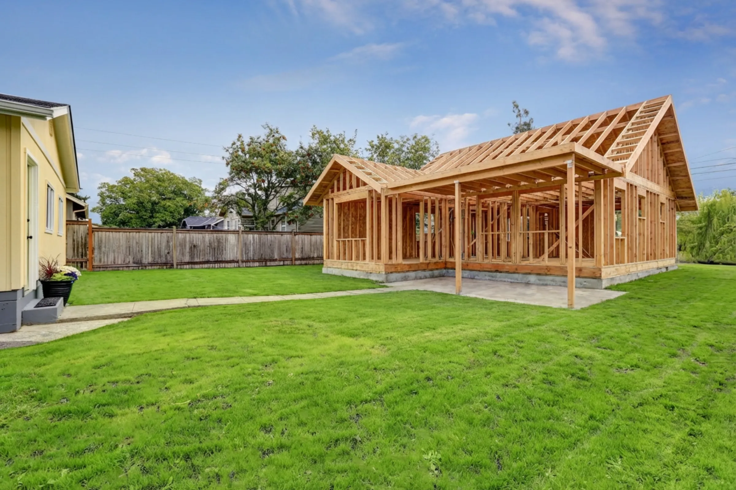 ADU builders in Los Angeles constructing a backyard accessory dwelling unit with wood framing structure